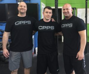 Jim "Smitty" Smith (left) and Joe DeFranco (right) with me at the CPPS.